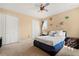 Bedroom has carpeted floors, a bed with white bedding, and Marvel themed decorations at 3759 Eagle Isle Cir, Kissimmee, FL 34746