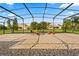 Spacious screened-in patio with patterned tile flooring and outdoor seating, perfect for relaxation at 3759 Eagle Isle Cir, Kissimmee, FL 34746