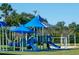 Community playground featuring slides and a covered play area, perfect for outdoor fun at 3759 Eagle Isle Cir, Kissimmee, FL 34746