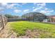 Backyard featuring a pool, a fenced yard, and a lawn area at 3824 Hickory Tree Rd, St Cloud, FL 34772