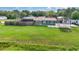 Charming single-story home with a lush green lawn, carport, and fenced backyard offering privacy at 3824 Hickory Tree Rd, St Cloud, FL 34772
