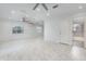 Airy living room with tile flooring, recessed lights, and neutral tones creating a calming ambiance at 3824 Hickory Tree Rd, St Cloud, FL 34772