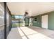 A screened porch leads to the backyard at 3824 Hickory Tree Rd, St Cloud, FL 34772