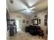 Recreation room featuring a sofa and classic arcade games for entertainment at 401 Chinahill Ct, Apopka, FL 32712