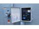 Electrical meter box with labeled electrical diagram and safety warning labels at 443 Cool Summer Ln, Davenport, FL 33837