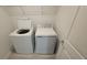 Convenient laundry room features a washer and dryer, making laundry tasks easy and efficient at 443 Cool Summer Ln, Davenport, FL 33837