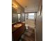 Clean bathroom featuring a glass-door shower, modern fixtures, and sink with vanity at 4447 Maple Chase Trl, Kissimmee, FL 34758