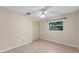 Simple bedroom with closet, window and neutral walls, offering a peaceful retreat at 4505 Kissimmee Park Rd, St Cloud, FL 34772