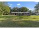 Charming one story brick home with expansive front lawn and mature trees in a quiet setting at 4505 Kissimmee Park Rd, St Cloud, FL 34772