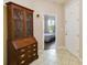 Inviting entryway with decorative furnishings leading to a glimpse of a bedroom at 4720 Doral Pointe Dr, Kissimmee, FL 34758