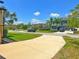A quiet neighborhood street with manicured lawns and well-maintained homes at 4720 Doral Pointe Dr, Kissimmee, FL 34758