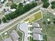 An aerial view shows the community with its well-maintained surroundings at 5473 Animosh Ct, Polk City, FL 33868