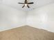 Bedroom featuring tile floors and a ceiling fan for added comfort at 5473 Animosh Ct, Polk City, FL 33868