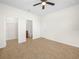 Spacious bedroom leading to ensuite bathroom and walk-in closet at 5473 Animosh Ct, Polk City, FL 33868