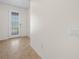 Bright foyer featuring decorative front door with tiled floor at 5473 Animosh Ct, Polk City, FL 33868