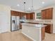 Well-equipped kitchen featuring stainless steel appliances, granite countertops, and lots of cabinetry at 5473 Animosh Ct, Polk City, FL 33868
