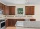 Kitchen featuring granite countertops and lots of cabinetry at 5473 Animosh Ct, Polk City, FL 33868