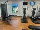 Well-equipped fitness center with modern exercise machines and a view of the outdoors at 5921 Lake Champlain Dr, Orlando, FL 32829
