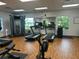 Spacious fitness center with modern exercise equipment and mirrored walls for a comprehensive workout experience at 5921 Lake Champlain Dr, Orlando, FL 32829