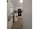 The well-equipped kitchen features sleek countertops, black appliances, and ample cabinet space at 5921 Lake Champlain Dr, Orlando, FL 32829
