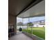 Screened lanai with tile floor leads to a well-maintained fenced backyard at 5921 Lake Champlain Dr, Orlando, FL 32829