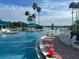 Beautiful community pool with umbrellas and lounge chairs, perfect for relaxation and recreation at 5921 Lake Champlain Dr, Orlando, FL 32829