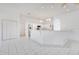Bright, all-white kitchen featuring tile floors, modern appliances and an open layout at 6555 Bay Tree Ct, St Cloud, FL 34771