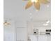 Bright living space with stainless steel appliances, white cabinets, and tile flooring at 6555 Bay Tree Ct, St Cloud, FL 34771