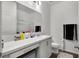 Well-lit bathroom with a spacious vanity and modern fixtures at 685 Overpool Ave, Davenport, FL 33896