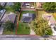 An aerial view of a home and lot surrounded by a red line at 812 Adour Dr, Kissimmee, FL 34759