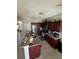 Spacious kitchen featuring stainless steel appliances and granite countertops at 939 Jaybee Ave, Davenport, FL 33897