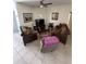 Cozy living room offering comfortable seating and a relaxing atmosphere at 939 Jaybee Ave, Davenport, FL 33897