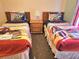Cute bedroom featuring two twin beds with decorative Star Wars themed bedding at 1006 Soaring Eagle Ln, Kissimmee, FL 34746