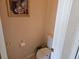 Powder room with tiled flooring and a toilet at 1006 Soaring Eagle Ln, Kissimmee, FL 34746