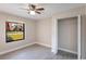 Cozy bedroom with a ceiling fan and a closet at 1022 Blue Horizon Dr, Deltona, FL 32725