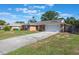 Well-maintained house with a brick facade and a spacious front yard at 1022 Blue Horizon Dr, Deltona, FL 32725