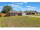 Charming single-story home with a well-manicured lawn and attached garage at 1022 Blue Horizon Dr, Deltona, FL 32725