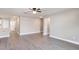 Open living room with sleek flooring and neutral walls at 1022 Blue Horizon Dr, Deltona, FL 32725