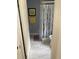 Bathroom featuring a clear shower curtain, framed picture and yellow towel with neutral walls and floors at 1101 28Th Nw St, Winter Haven, FL 33881