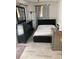 Bedroom with simple design and neutral walls and floors with dresser and bed at 1101 28Th Nw St, Winter Haven, FL 33881