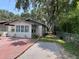 Exterior corner view of a single-story home featuring a fenced yard at 1101 28Th Nw St, Winter Haven, FL 33881