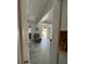 Bright living room featuring tile floors, neutral colors, and a decorative wall mirror at 1101 28Th Nw St, Winter Haven, FL 33881