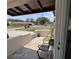 A quaint covered front porch offers a peaceful welcome to the home at 1101 28Th Nw St, Winter Haven, FL 33881