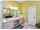 This main bathroom includes a double vanity and countertop space, perfect for getting ready in the morning at 12134 Shadowbrook Ln, Orlando, FL 32828