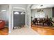 Entryway featuring a dining room with a decorative chandelier and an area rug at 12134 Shadowbrook Ln, Orlando, FL 32828