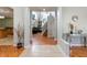 Foyer leading to an open floor plan with a staircase and living spaces at 12134 Shadowbrook Ln, Orlando, FL 32828
