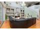 Spacious living room with built-in shelving and modern decor at 12134 Shadowbrook Ln, Orlando, FL 32828