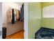 View of a walk-in closet and a luxurious garden tub in the adjacent bathroom creating spa like feel at 12134 Shadowbrook Ln, Orlando, FL 32828