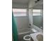 Standard bathroom with shower over tub, and tile surround at 123 S Roma Way, Kissimmee, FL 34746