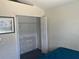 Bedroom with ample space, closet, and natural light provides a relaxing retreat at 123 S Roma Way, Kissimmee, FL 34746